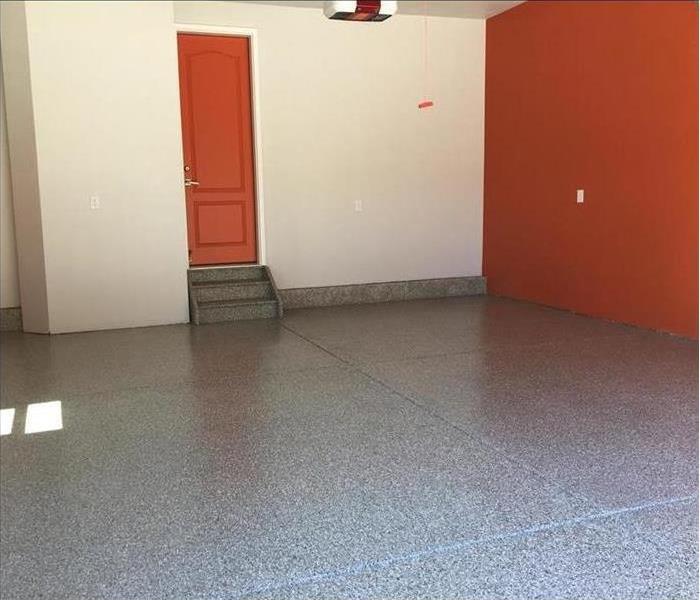 Garage with orange wall and door??