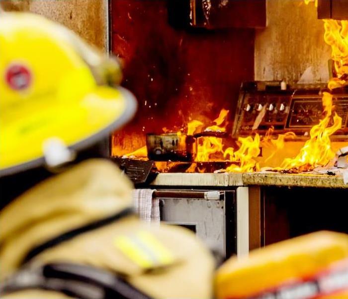 Fireman in kitchen fire